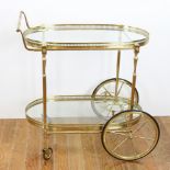 Hollywood Regency brass bar cart. Provenance: From a Swampscott, Massachusetts estate.