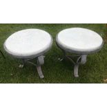 Pair of painted brown metal round tables.