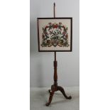 English pole screen with needlepoint, 54" H x 17" W. Provenance: From a Fitchburg, Massachusetts