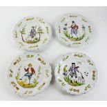 Group of four (4) French scalloped edge plates, various portraits, 11" diameter. Provenance: From