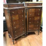 Pair of 1920s walnut tall chests, 56 1/2" H x 24" W x 18" D.. Provenance: From the estate of Mary