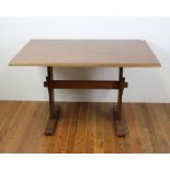 Early trestle base dining table, 30" H x 47" W x 33" D.