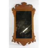 Tiger maple Chippendale-style mirror, 37" x 20". Provenance: From a Delray Beach, Florida estate.