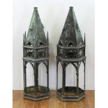 Two Gothic bronze light fixtures, 39" H x 13" W. Provenance: From an Everett, Massachusetts estate.