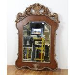 Chippendale-style beveled glass mirror, 57" H x 40' W. Provenance: From a Wantagh, New York estate.