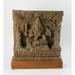 Ancient Indian wood carving of Durga, goddess of war, 12 1/2" H x 13 1/2" W. Provenance: From a