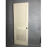 Custom painted wood shutter door, 83 1/2" H x 30" W x 1 3/4" D. Provenance: Studio Props of Martha