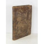 Leather bound prayer book in Hebrew, dated 1860, 12" x 9".