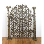 Antique bronze floral gate, 48" H x 29", with two posts, 48" H, by J.C. Georhart. Provenance: From