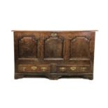 C18th Oak Mule Chest with hinged top, triple panelled front, 2 lower drawers with brass plate swan