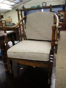 BEECHWOOD FRAMED HORSESHOE BACK ARMCHAIR WITH CREAM UPHOLSTERY