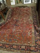 GOOD QUALITY RED GROUND AND FLORAL FLOOR RUG