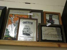 FIVE ASSORTED SMALL PUB TYPE MIRRORS TO INCLUDE VOGUE, CUTTY SARK SCOTCH WHISKY, SAMUEL COLT ETC