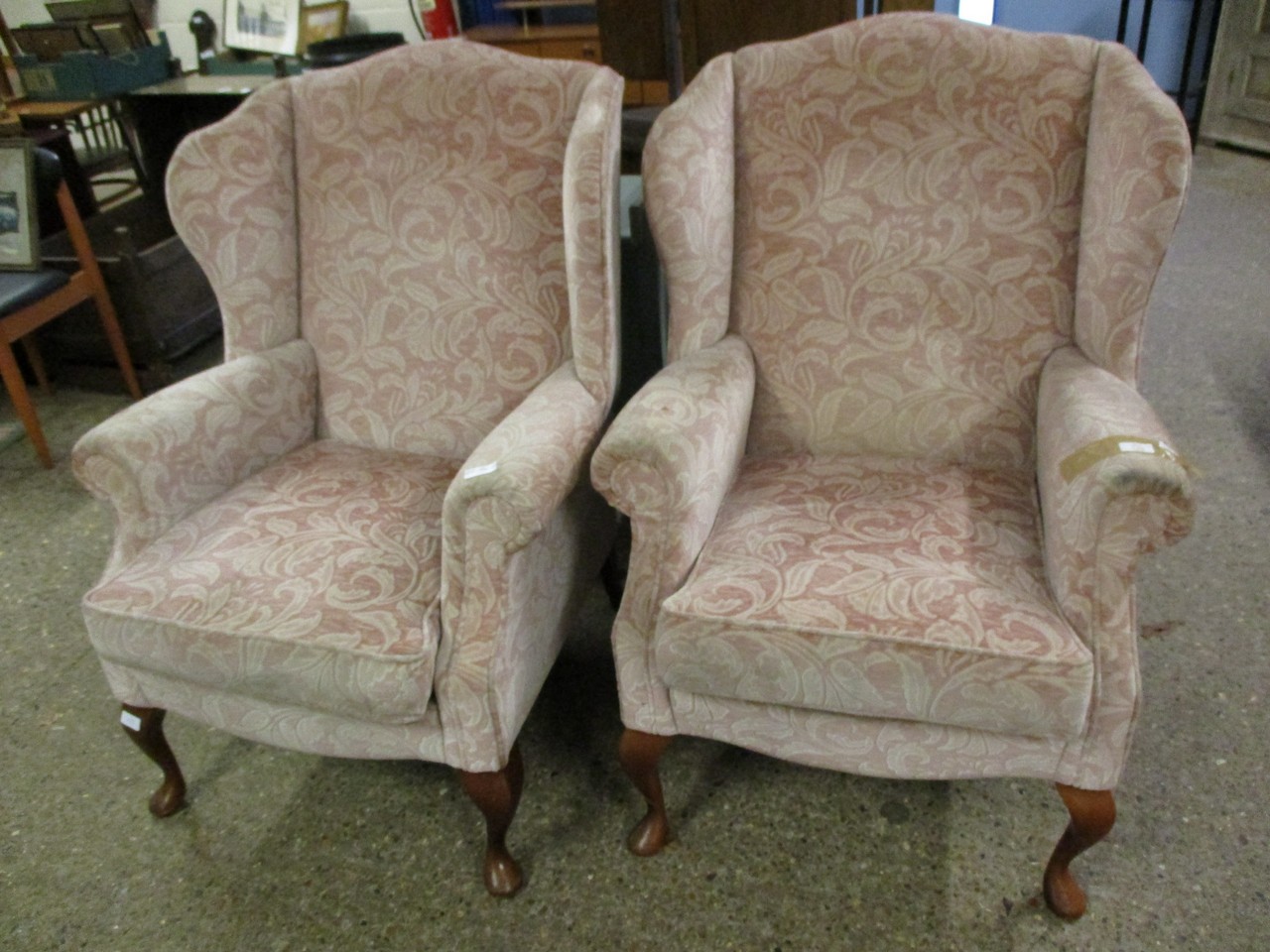 PAIR OF MODERN PINK FLORAL WING ARMCHAIRS WITH BEECHWOOD LEGS