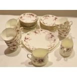 Minton ancestral china tea set and serving plate with 11 cups^ saucers^ and a milk jug^ plus 9