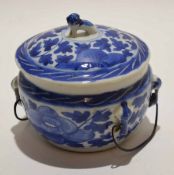 Chinese porcelain blue and white jar and cover with dog of fo finial^ both jar and cover with floral