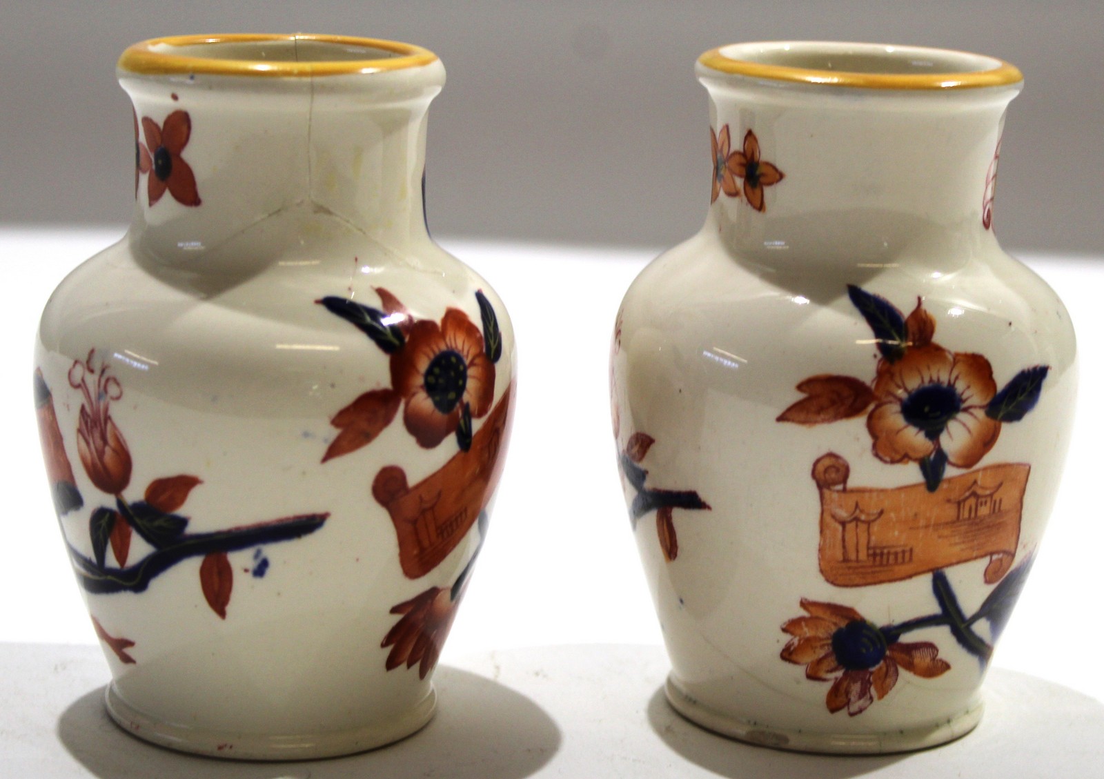 Pair of Staffordshire late 19th century vases with an Imari style design^ 10cm high (2)