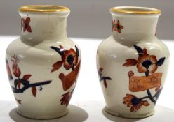 Pair of Staffordshire late 19th century vases with an Imari style design^ 10cm high (2)