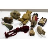 Group of early 20th century soft toys^ some modelled as animals^ others as dolls and a small teddy