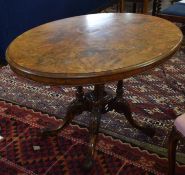Victorian walnut pedestal breakfast table with oval top on a quadruped base^ 120cm wide