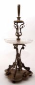 Late 19th century electro-plated table centrepiece^ the triform base on compressed feet to a cast