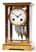 Late 19th century French lacquered band brass four-glass mantel clock^ the plinth shaped case with