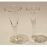 Large wine glass with tear drop stem^ together with a further twist wine glass^ the ogee bowl