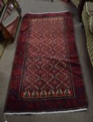 Modern Caucasian carpet^ central panel of geometric lozenges on a mainly beige and red field with