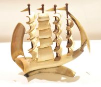 Vintage horn model of a four-masted sailing ship^ 36cm high