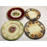 Group of four Royal Worcester plates^ late 19th/early 20th century^ one with flowers^ signed by