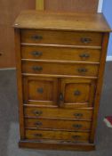 Late 19th century Wellington style light oak chest^ fitted with six graduated drawers and central