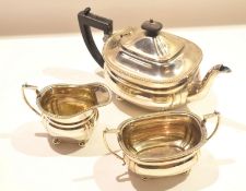 Silver plated three-piece tea service^ retailed by Harrods