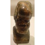 Marble bust of an African head^ 30cm high