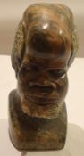 Marble bust of an African head^ 30cm high