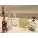 Set of four glass decanters^ late19th/early 20th century^ including a decanter with cranberry design