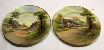 Two Royal Worcester plates with landscape decoration by Raymond Rushton^ one of Welford on Avon^ the