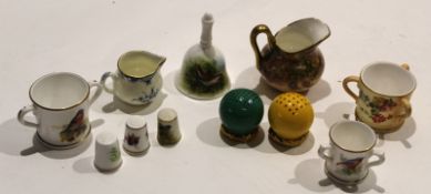 Group of Royal Worcester miniature wares including three tygs^ two painted with bird decorations^