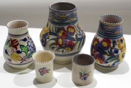 Group of mid-20th century Poole pottery wares with typical floral designs after Truda Carter^ (5)