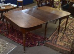 Regency period mahogany D-end dining table raised on eight ring turned supports^ extends to 2.07m^