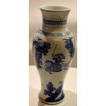 Large Chinese porcelain baluster vase^ after a Kangxi original^ decorated with a blue and white