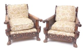 Late Victorian mahogany Bergere suite comprising a three-seater sofa and two matching easy chairs^