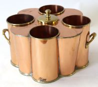 Interesting brass and copper four-bottle wine cooler^ central ice reservoir^ probably for White Star