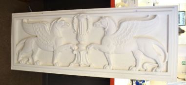 Large white painted composition plaque depicting mythological design^ 157cm wide