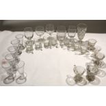 Collection of glass wares^ 19th/20th century^ including glass cups^ glass rummers and liqueur