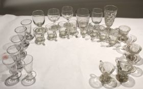 Collection of glass wares^ 19th/20th century^ including glass cups^ glass rummers and liqueur