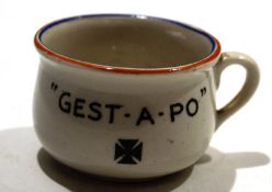 Miniature humorous chamber pot of WWII interest^ decorated with an image of Hitler to the interior