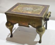 19th century brass footman applied on either side with handles and with cabriole front supports