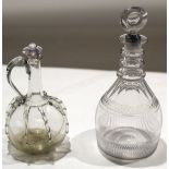 Two cut glass 19th century decanters with original stoppers (2)^ largest 28cm high