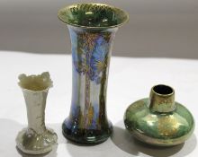 Group of Royal Worcester Crown ware lustre vases with floral type decoration on a lustre and gilt