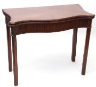 18th century mahogany fold-top tea table cross banded top^ serpentined front over a plain frieze and